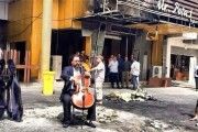 Karim Wasfi plays cello at Baghdad Bombing Site